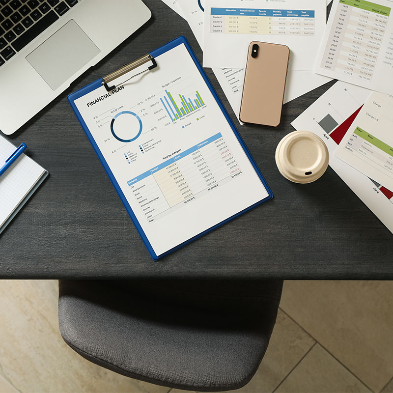 concept of financial planning on gray wooden table